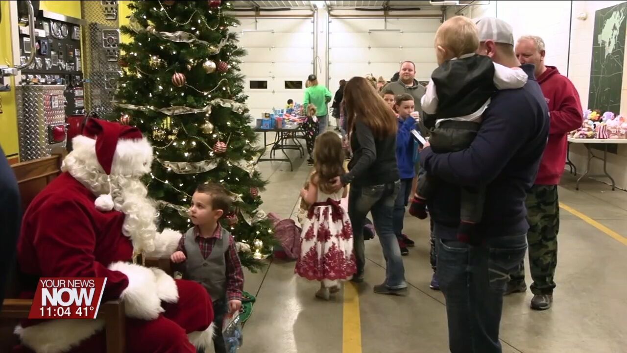 Kids of Russells Point see Santa ride through their neighborhoods